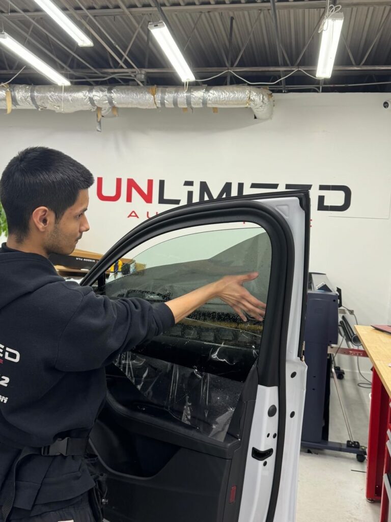 window-tint-installation-in-process-unlimitedautostyle-3